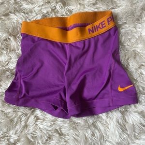 Purple and orange Ñike pros